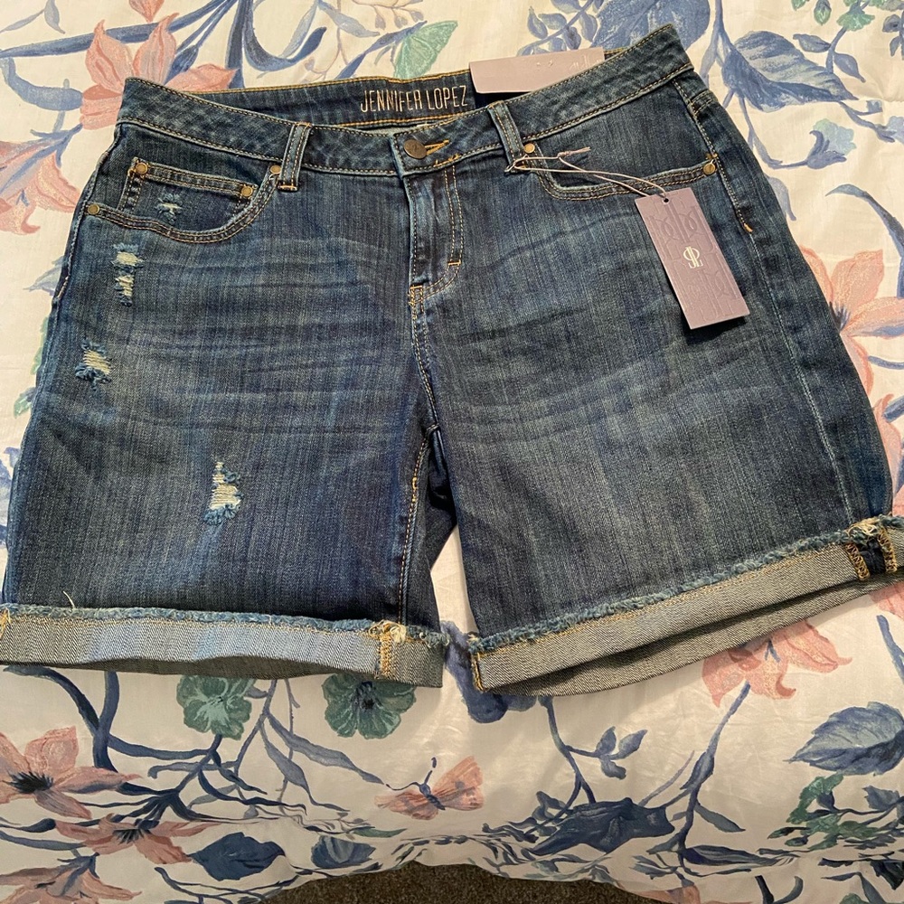 Jennifer Lopez distressed denim shorts